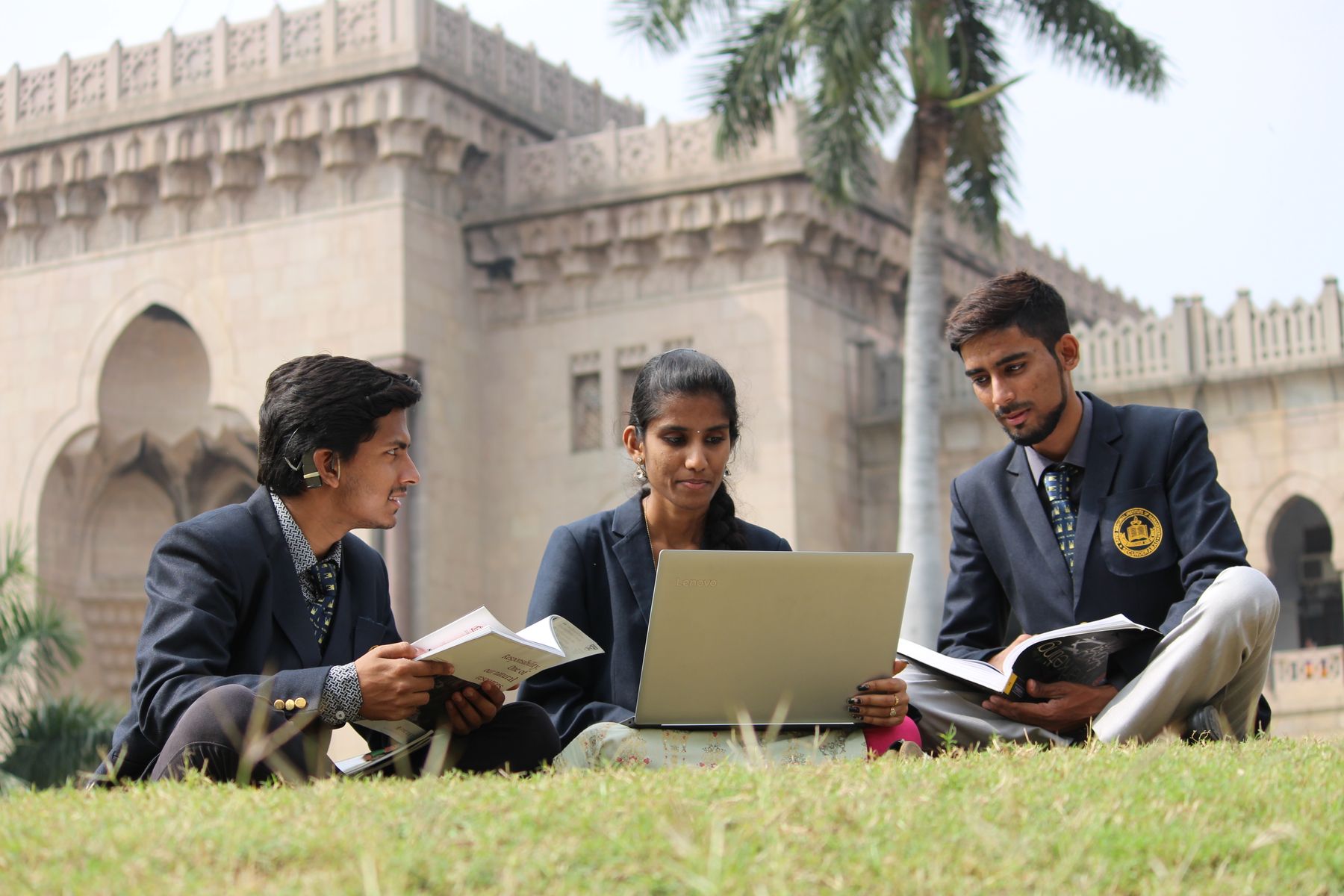 Indian students collaborating on a technology project