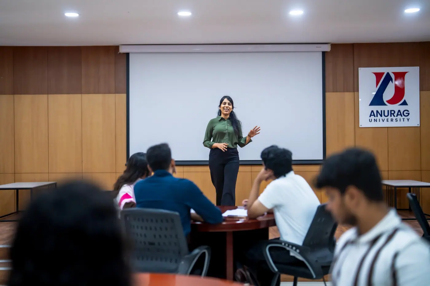 A mentor presenting to a class of engineering students