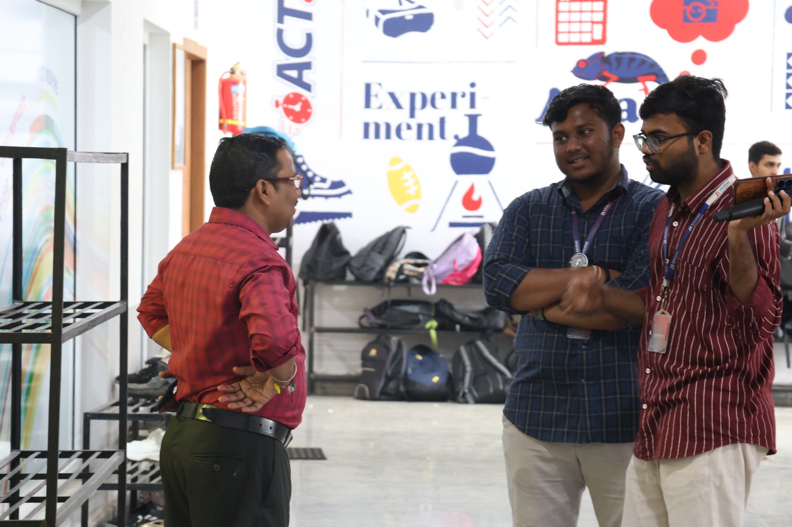 Mentor and students collaborating in a workshop